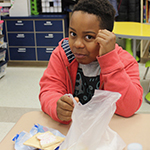  Student eats breakfast in classroom